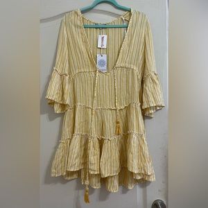 Yellow pull over for the beach! 
Size - S 
BRAND NEW - WITH TAGS